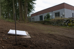 Blogs A SiteFacts site visit. property pin visible in Oregon lot, documents being reviewed for ADU due diligence.