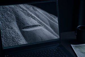 LiDAR hillshade revealing a cut-and-fill bench on a Lane County Oregon slope property